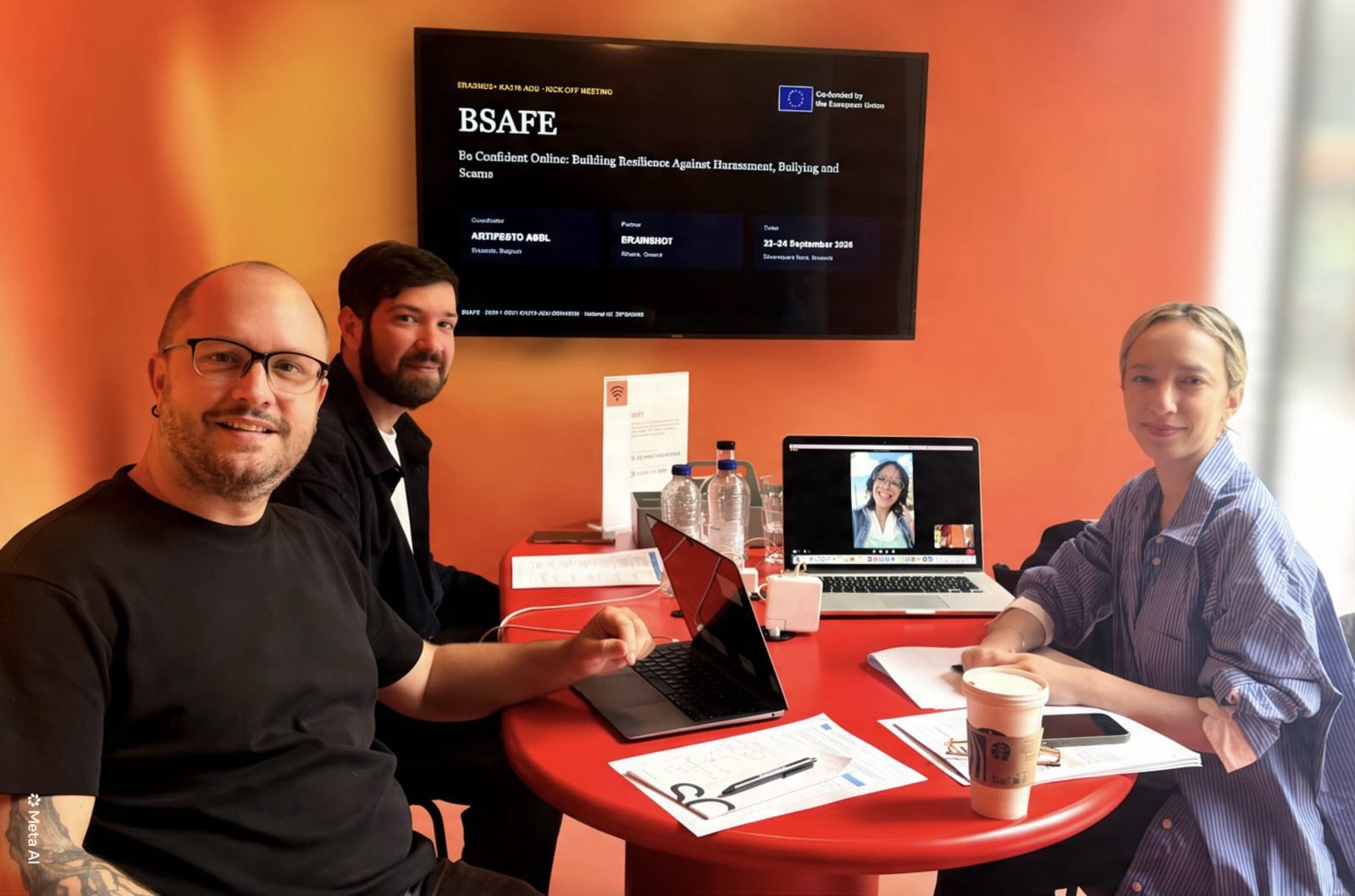 The two project teams around a table at the kick-off, with the BSAFE title slide and the EU emblem on the screen behind them.